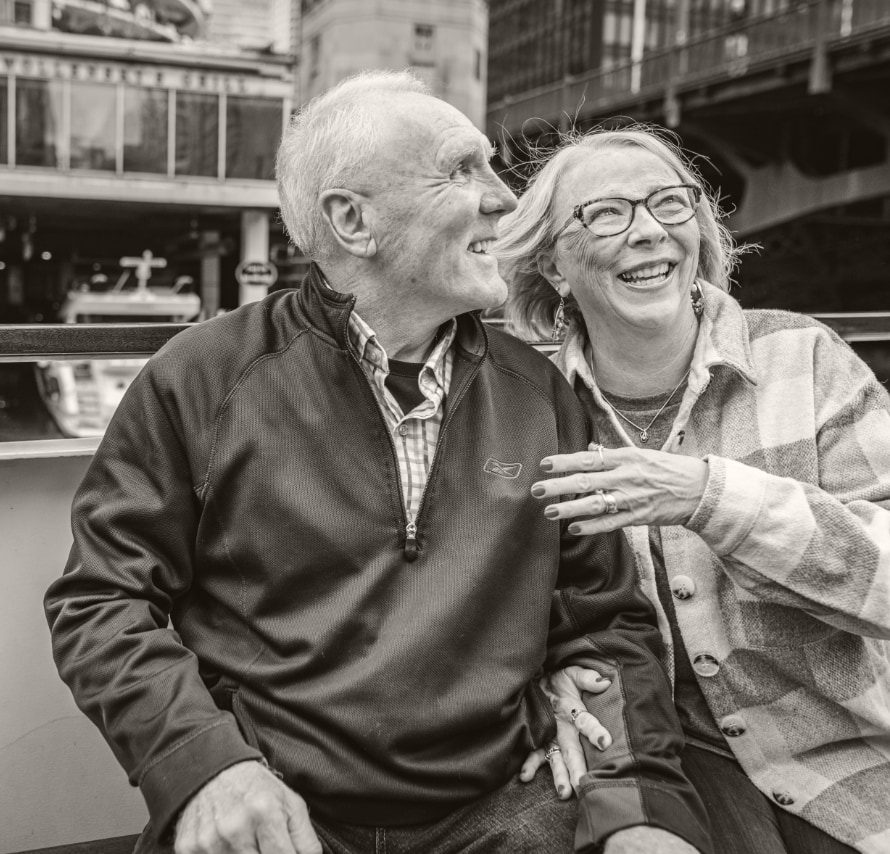 Elderly Couple Smiling in City